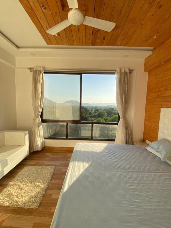 Serene Hill view 1BHK I Pool & Gym I Udaipur - image 10