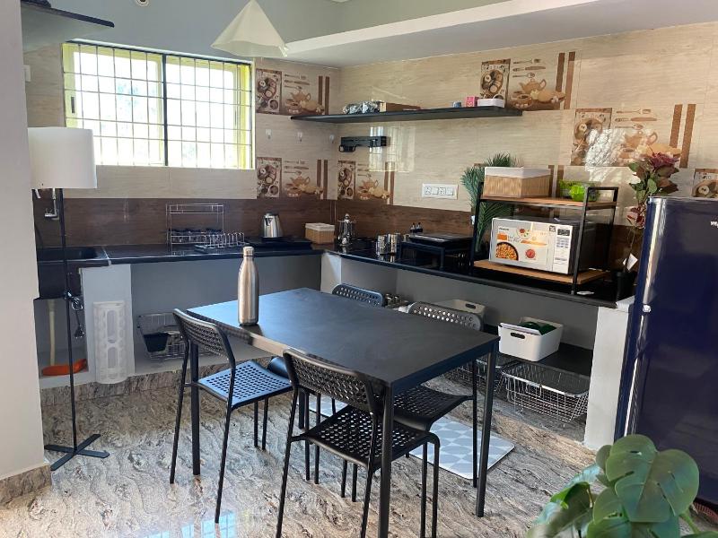 Mindful Rooftop Yoga Stay in Gokulam Bright Airy Private Family Terrace Apartment - image 8