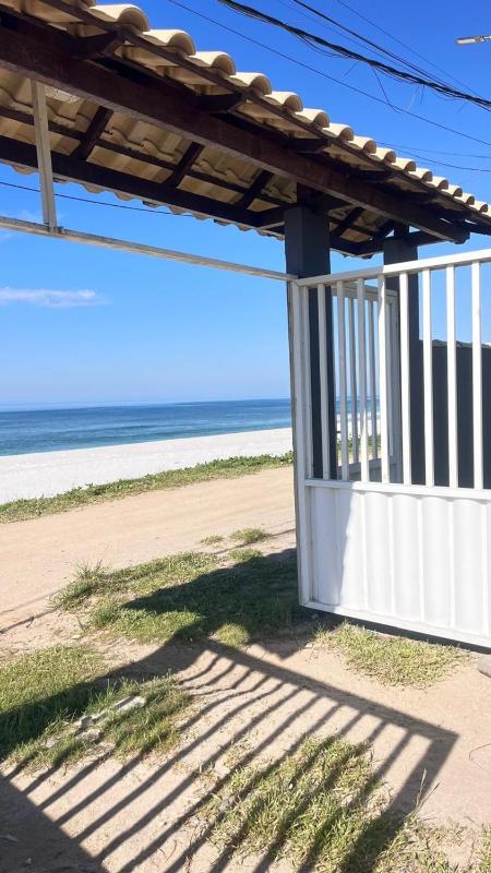 Casa frente ao mar pé na areia - image 43