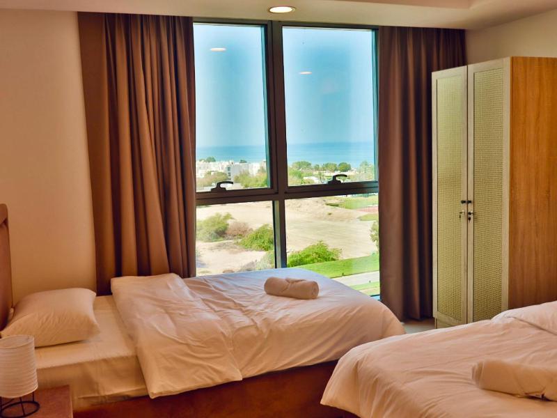 Modern 2BR Oasis - Balcony With Sea View - image 14