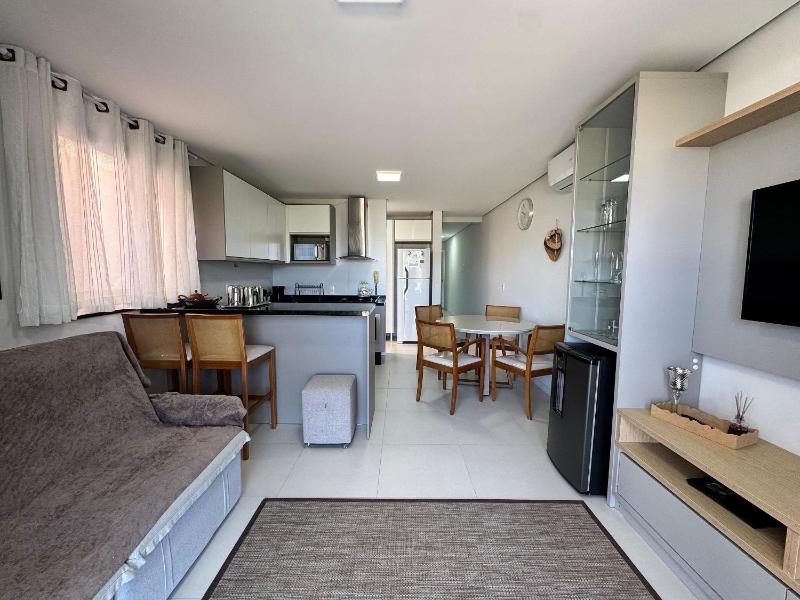 Quinta do Arvoredo – Apartamento confortável na Praia de Palmas com dois dormitórios incluindo uma suíte a 500 metros do mar. - image 1