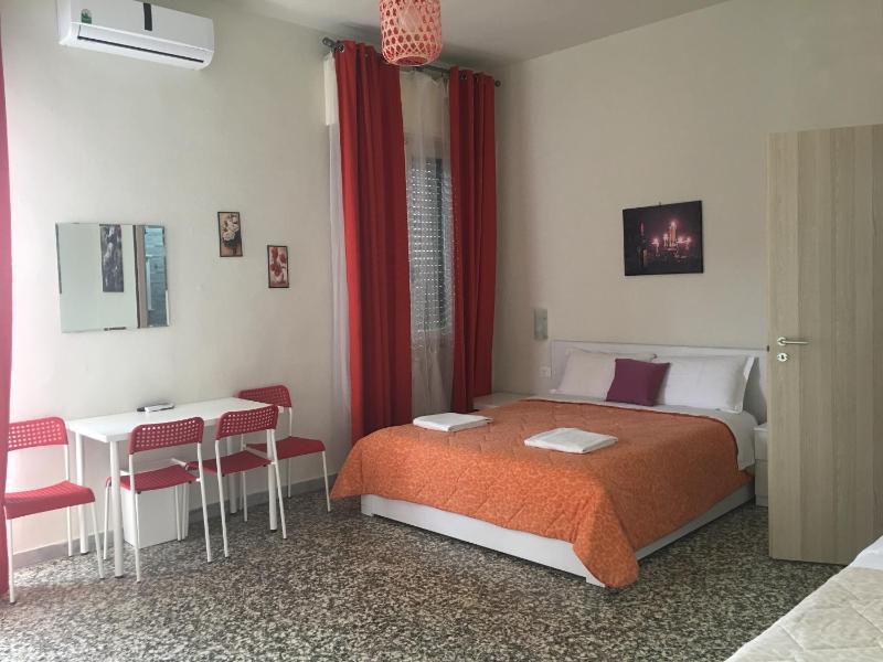 Quadruple Room with Private Bathroom image 2
