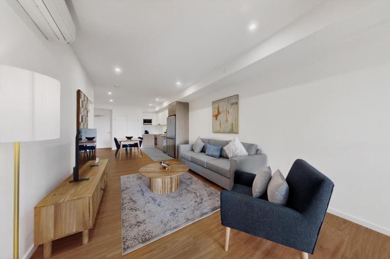 Modern 2-Bed Apartment with Private Balcony - image 12