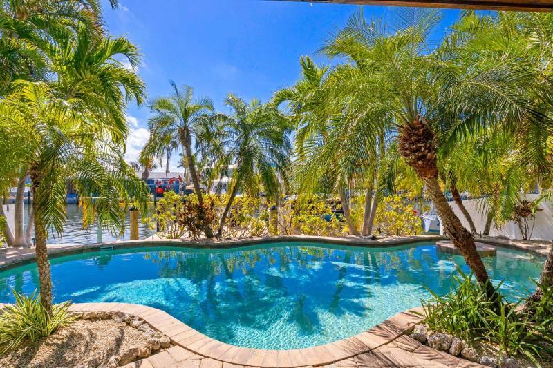 My Grand Floridian - Canal Front Dock Pool Games by Anna Maria Life Vacation Rentals - image 13