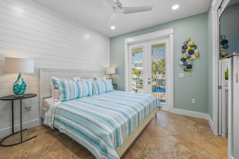 My Grand Floridian - Canal Front Dock Pool Games by Anna Maria Life Vacation Rentals - image 8