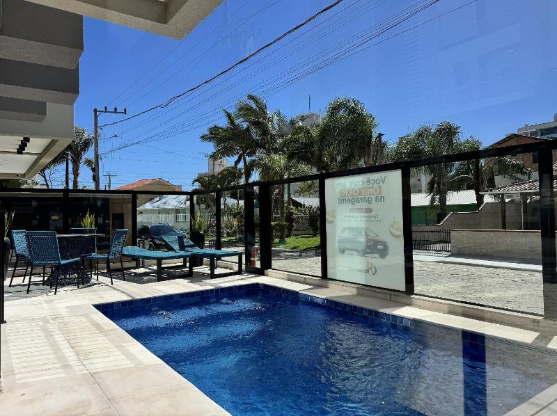 Invictus Residence 202 - Apartamento amplo com ar-condicionado em todos os ambientes localizado próximo a comércios e a 250 metros da praia. - image 4