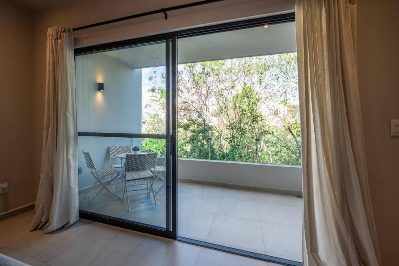 Spacious 3BR w Private Balcony Resort Amenities - image 8