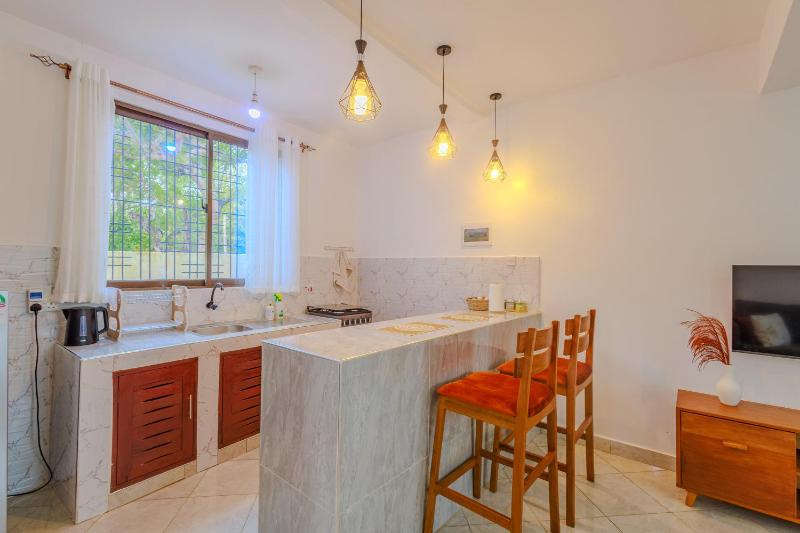 Marahaba Holiday Suites Ground Floor 1BR 5 Min Drive to Nomad Beach - image 12