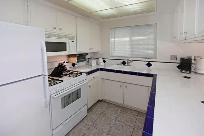 Location! Walk to beach grocery restaurants home - image 3