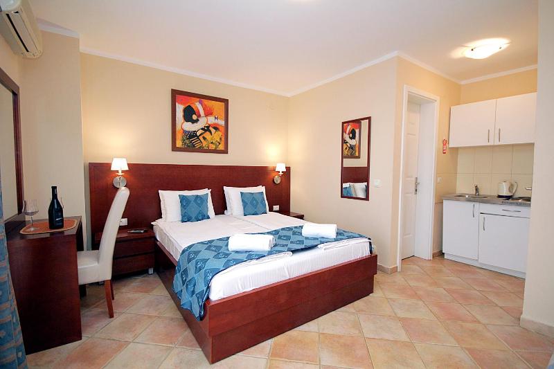 Standard Triple Studio with balcony and Partial Sea View image 3