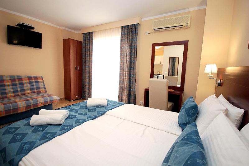 Standard Triple Studio with balcony and Partial Sea View image 2