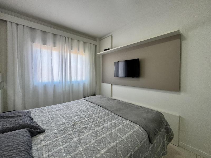 Luize 302 - Apartamento amplo com 3 dormitórios a 300m do mar. - image 13