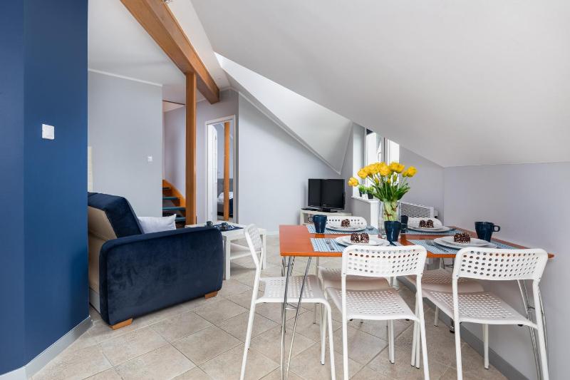 Przytulny Apartament Blisko Plaży by Noclegi Renters - image 11