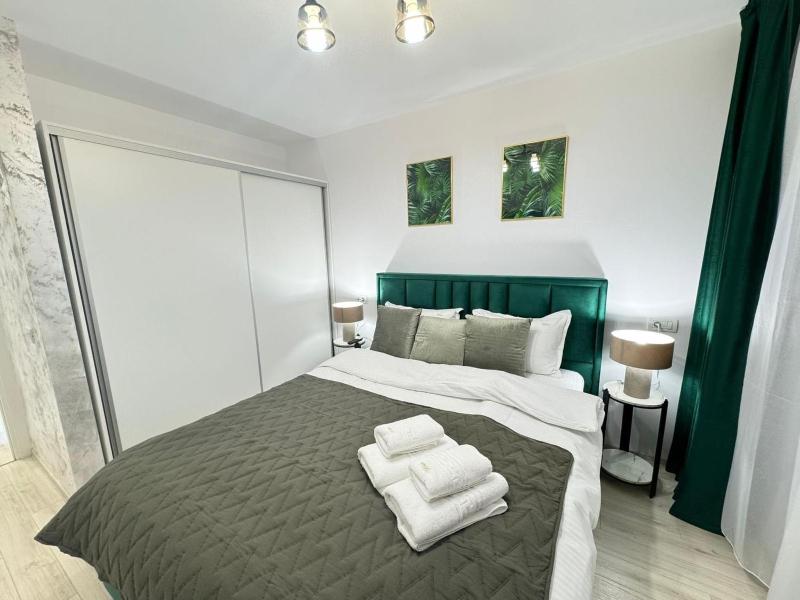 Luxury Apartments near Coresi Mall by GLAM - Parking Option - image 7