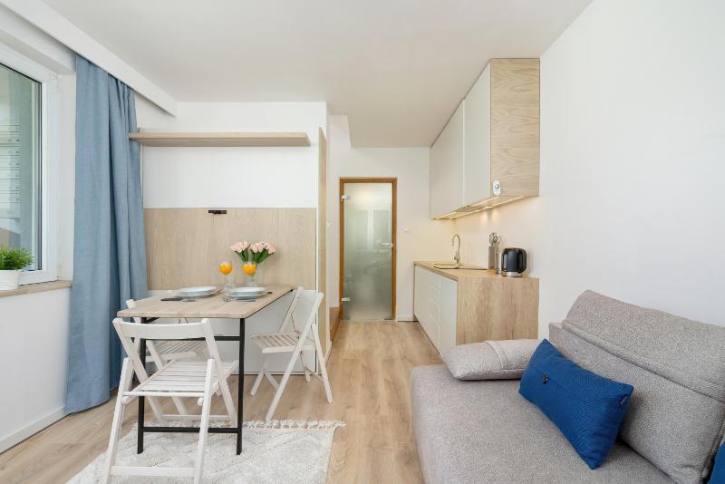 Functional Studio with Parking by Noclegi Renters - image 11