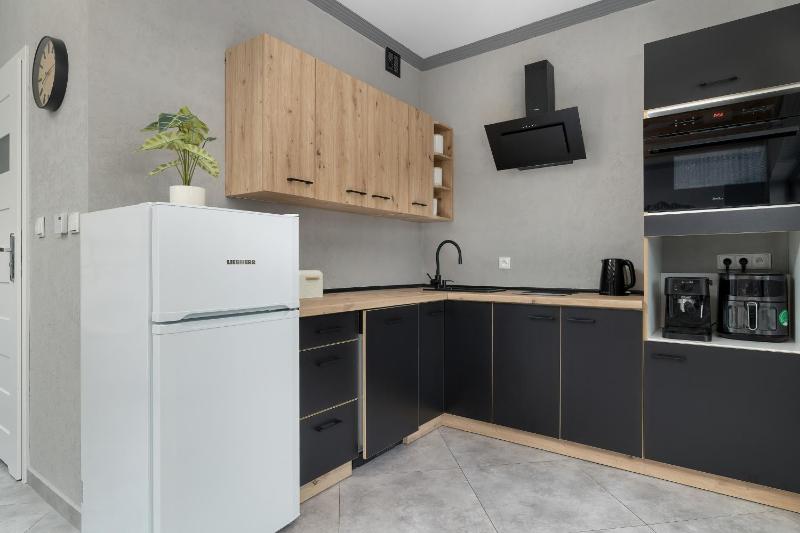 Sunny Apartment with Parking Jacuzzi Sauna & Balcony with Mountain View by Noclegi Renters - image 8