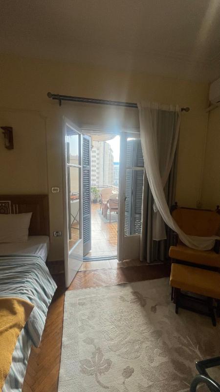 Cozy central Private Room with double bed shared bathroom Downtown Cairo - image 15