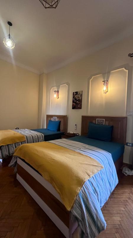 Cozy central Private Room with double bed shared bathroom Downtown Cairo - image 13