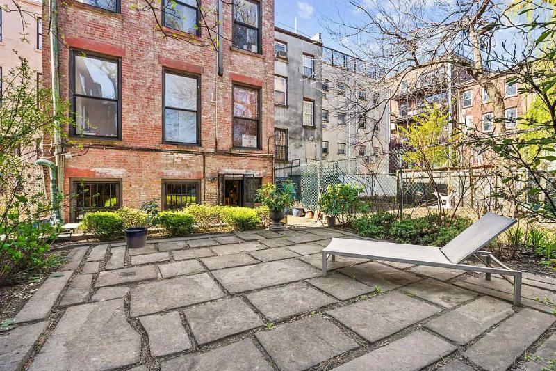 Lenox Garden Fully-Furnished 1BR in Harlem with Outdoor Space - image 4