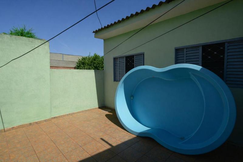 Casa com Churrasqueira e WiFi em Parque Ribeirao - image 13