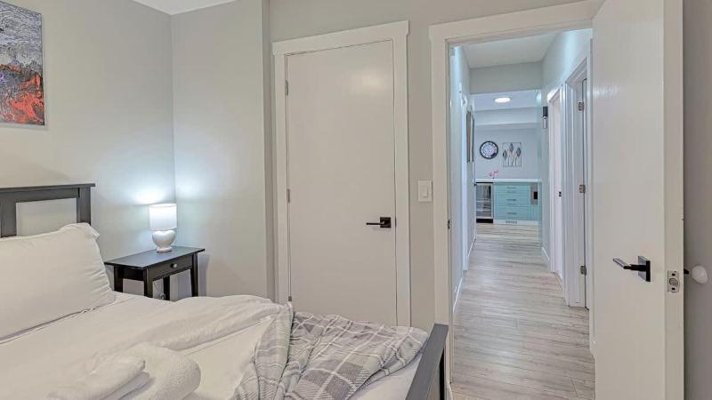 Modern 3BR Suite Steps to C-Train Near Zoo & DT - image 11