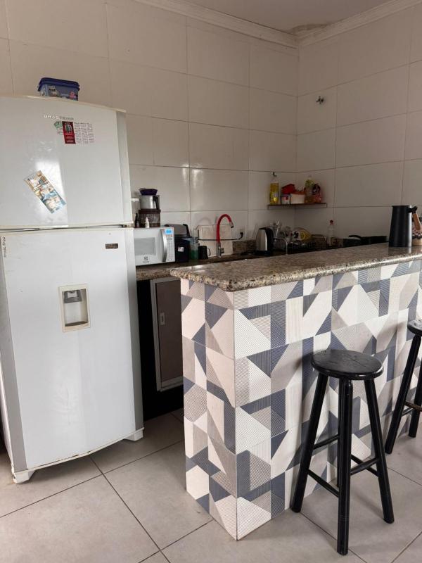 Casa de temporada pe na areia indaia proximo a praia - image 10