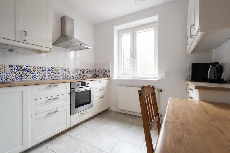 Spacious Apartment with Garden in the Tri-City by Noclegi Renters - image 14