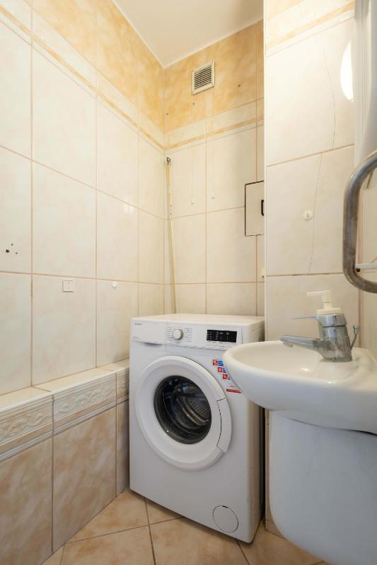 Spacious Apartment with Garden in the Tri-City by Noclegi Renters - image 13
