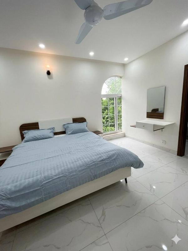 Demure Apartments Modern 2 BR Gulberg Near Qaddafi Stadium - image 13