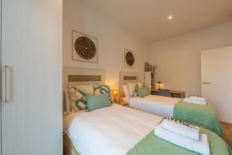 2BR Apt with Terrace & Parking Near Beach & Town - image 10