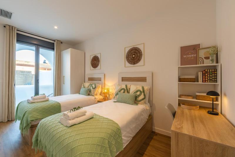 2BR Apt with Terrace & Parking Near Beach & Town - image 34