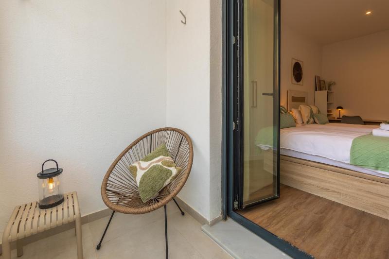 2BR Apt with Terrace & Parking Near Beach & Town - image 24