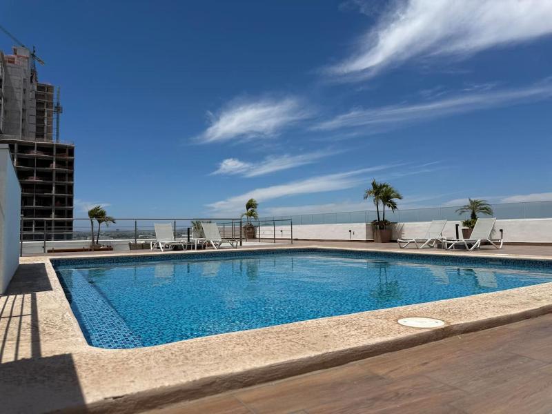A una calle de la playa con alberca en roof - image 27