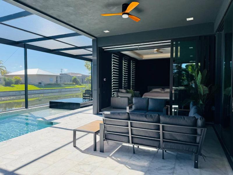 Modern Luxe Home - pool jacuzzi and channel view - image 3
