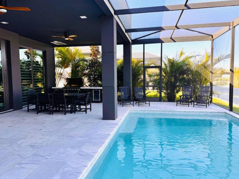 Modern Luxe Home - pool jacuzzi and channel view - image 7