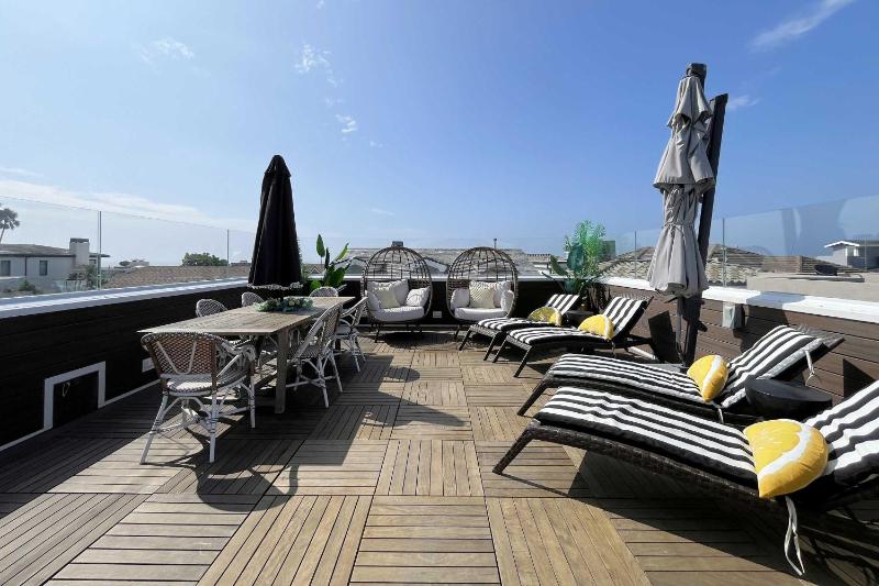 Coastal Luxury Retreat with Stunning Rooftop Deck townhouse - image 33