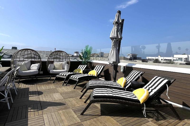 Coastal Luxury Retreat with Stunning Rooftop Deck townhouse - image 35