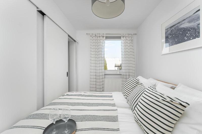 Cozy Apartment with Balcony Near the Sea by Noclegi Renters - image 1