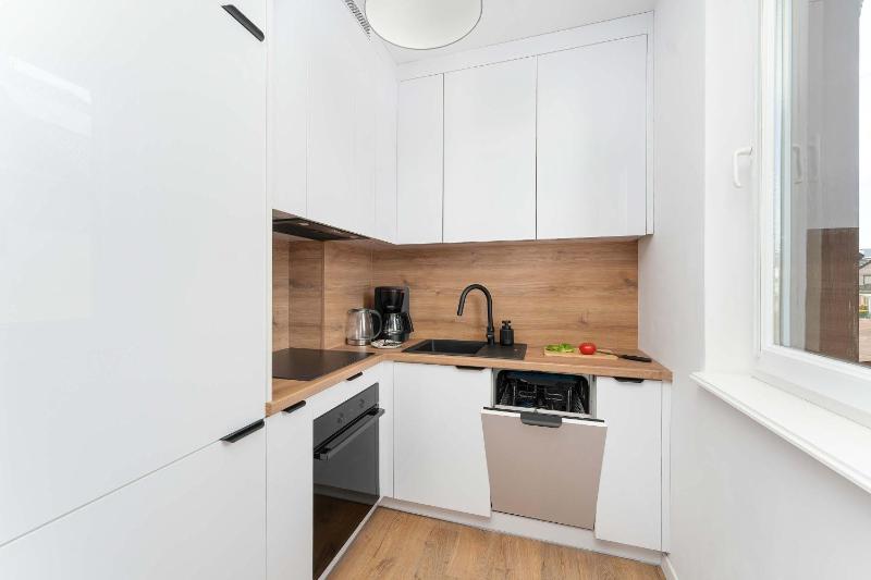 Cozy Apartment with Balcony Near the Sea by Noclegi Renters - image 21