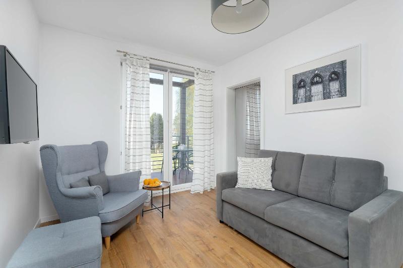 Cozy Apartment with Balcony Near the Sea by Noclegi Renters - image 17