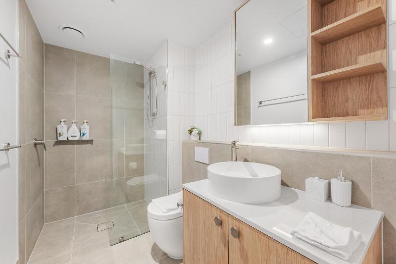 Modern 2BR Apt Near Hospital Pool n Parking - image 11