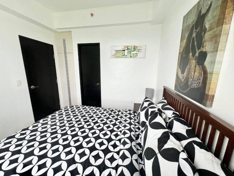 Serene 1-Bedroom Apartment in Boracay with Pool Access - image 13
