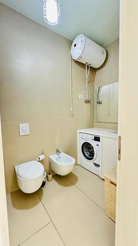 Luxury 2BR Apartment at Green Coast 104D - image 2