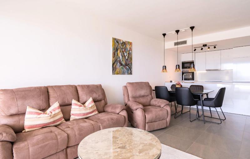 Exclusive Two-Bed Coastal Apartment in Pure South - image 34