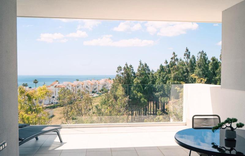 Exclusive Two-Bed Coastal Apartment in Pure South - image 36