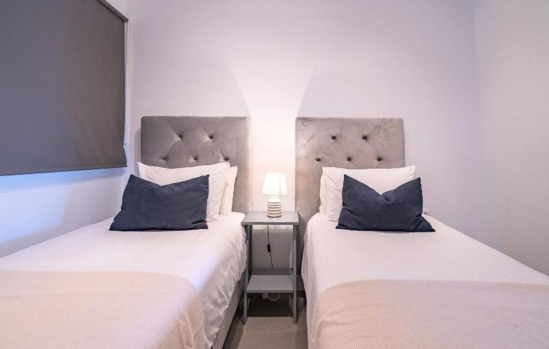 Exclusive Two-Bed Coastal Apartment in Pure South - image 23