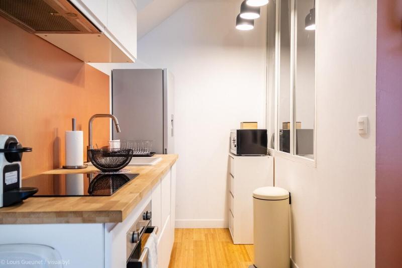Appartement à deux pas du marché central - image 11