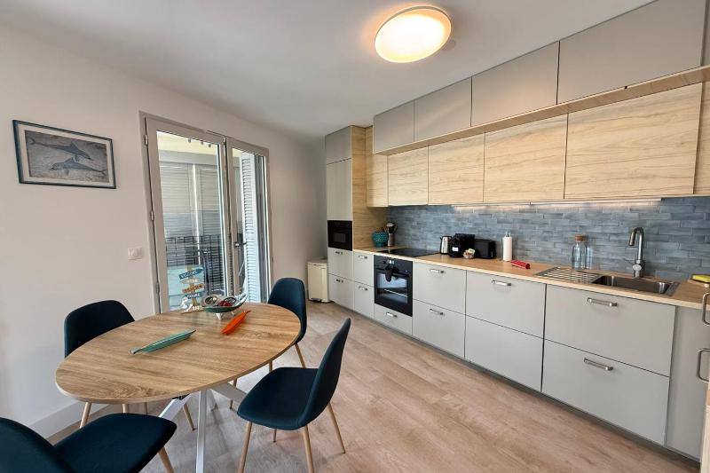 Appartement neuf - terrasse & parking 2 chambres - image 13