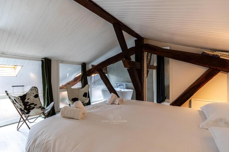 Duplex d'exception et charme au centre historique - image 21
