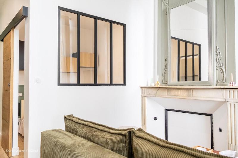 Appartement rénové en plein coeur de ville - image 12